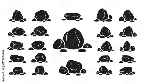 Black silhouettes of various rocks and stones isolated on white background
