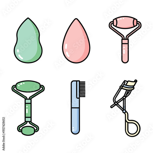 Collection of beauty tools including green gua sha pink makeup sponge rose quartz roller comb and eyelash curler