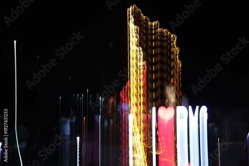 Photography Long exposure intentionally blurred night photography of glowing Davanagere engineering landmark