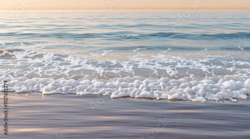 Wallpaper Mural Ocean Tranquility: Soft waves gently caress the shoreline as the sun sets, casting a warm glow over the tranquil ocean, evokes a sense of peace and serenity. Torontodigital.ca