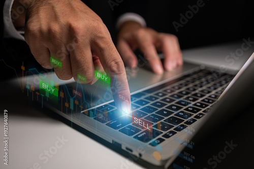 Investor analyzing market data on laptop with buy and sell indicators, making strategic decisions in online trading and financial investment management.