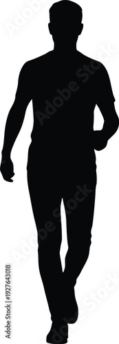 Silhouette of a man walking alone in a casual pose
