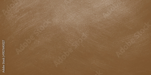 A vintage brown leather texture background with a rough aged grunge pattern and antique textured surface for a blank material backdrop