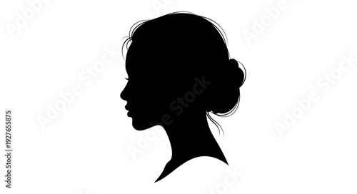 Silhouette Profile of a Young Woman with Hair Bun.