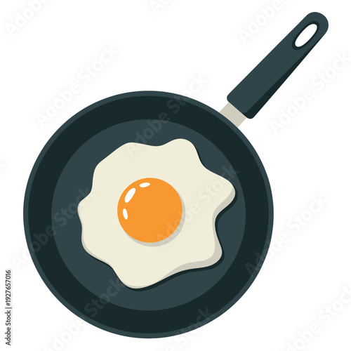 Fried egg cooking in a black frying pan on a white background