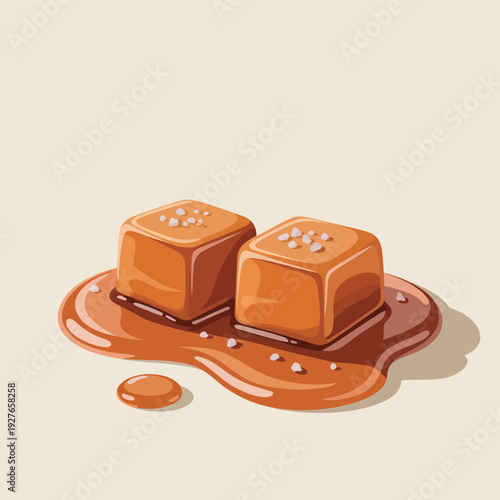 Two delicious caramel candies with sea salt on a caramel sauce puddle