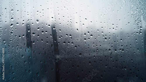 Tableau sur toile Raindrops on Window Glass with Foggy Background on Rainy Day