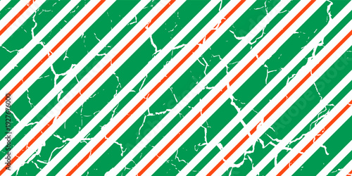Christmas seamless pattern. Red and green diagonal stripes background. Candy cane repeating decoration wallpaper. Winter holiday lines backdrop. Xmas peppermint present wrapping print design. Vector