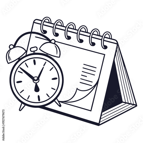 A calendar and an alarm clock sitting next to each other