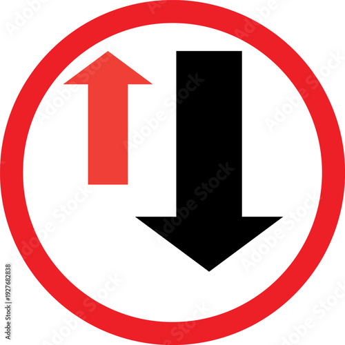 Give way to oncoming traffic road sign, red and black arrows in circular safety regulatory symbol