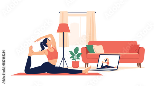 Young woman practicing an advanced yoga pose on a mat in her living room while following an online tutorial on her laptop for home fitness.