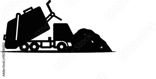 Truck unloading heap of debris