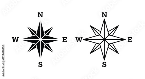 Two contrasting compass roses displaying cardinal directions in black and white