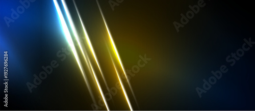 Abstract background. Diagonal lines create dynamic light effect. Blue, yellow, white colors dominate dark space. Modern design element.