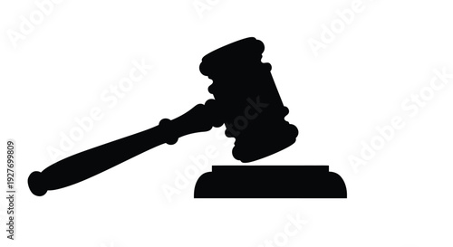 Black silhouette of a gavel resting on a wooden sound block