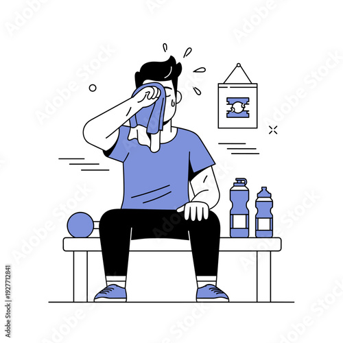 Young adult male cooling down after workout with towel and water bottles
