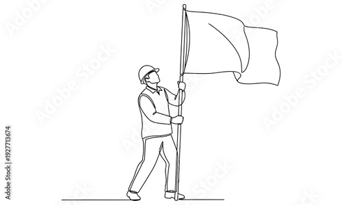 A person holding a flag on a pole standing tall