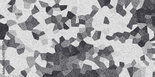 Abstract mosaic-like pattern in grayscale with a speckled texture, creating a geometric yet organic visual for backgrounds and creative design elements
