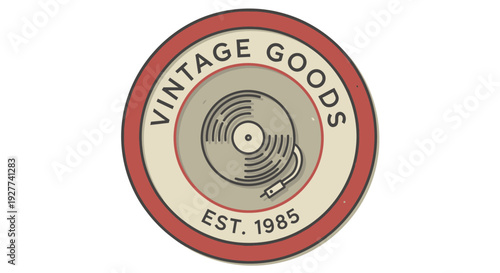 Vintage Goods logo with vinyl record emblem and establishment year 1985.