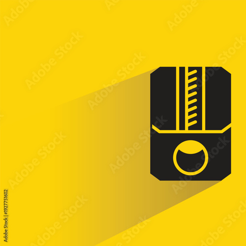 pencil sharpener with shadow on yellow background