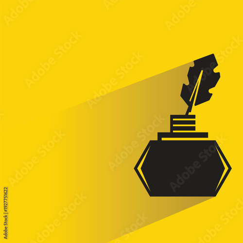 inkpot and quill icon with shadow on yellow background