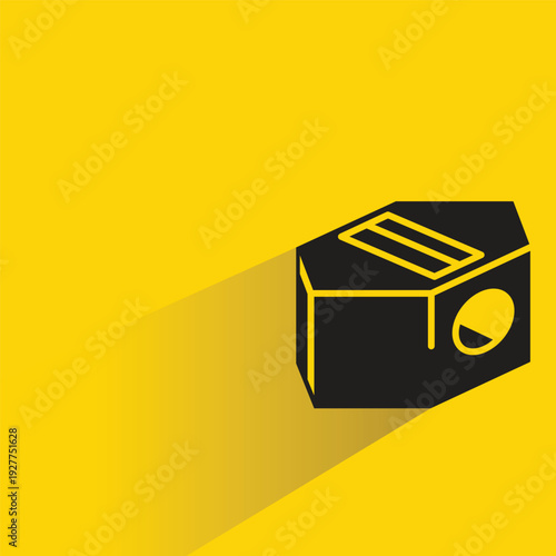 pencil sharpener with shadow on yellow background