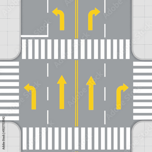 Aerial View of City Intersection with Traffic Lanes and Pedestrian Crosswalks