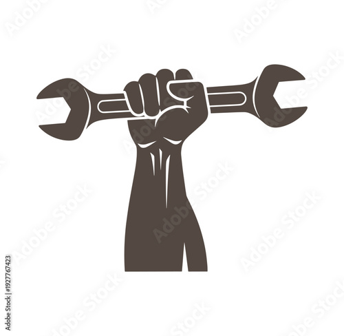 Hand holding adjustable wrench in fist  tool for gripping and twisting objects