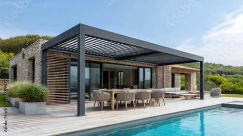 Modern stone house with a sleek pergola and swimming pool for outdoor living