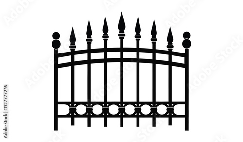 Black metal fence gate with pointed tips and circular details