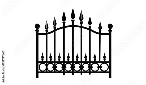 Black metal gate with pointed tips and decorative circles