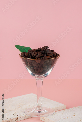 Wallpaper Mural Coffee beans in a wine glass and photo props with a pink backdrop. Torontodigital.ca