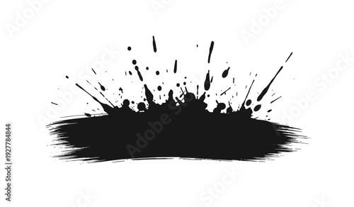 Black paint splatter on a creating a dynamic abstract design element