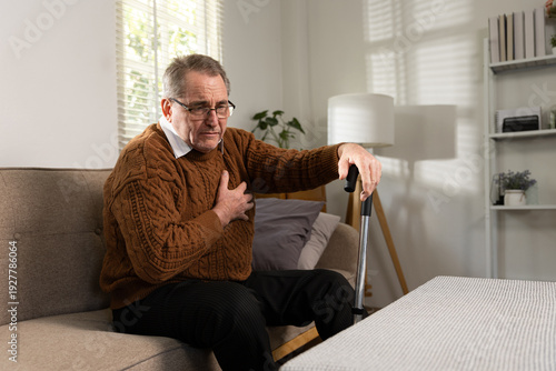 Elderly man with chest pain suffering from heart attackElderly man with chest pain suffering from heart attack.