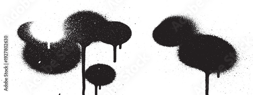 Abstract Black Spray Paint Splatters and Drips on White Background.