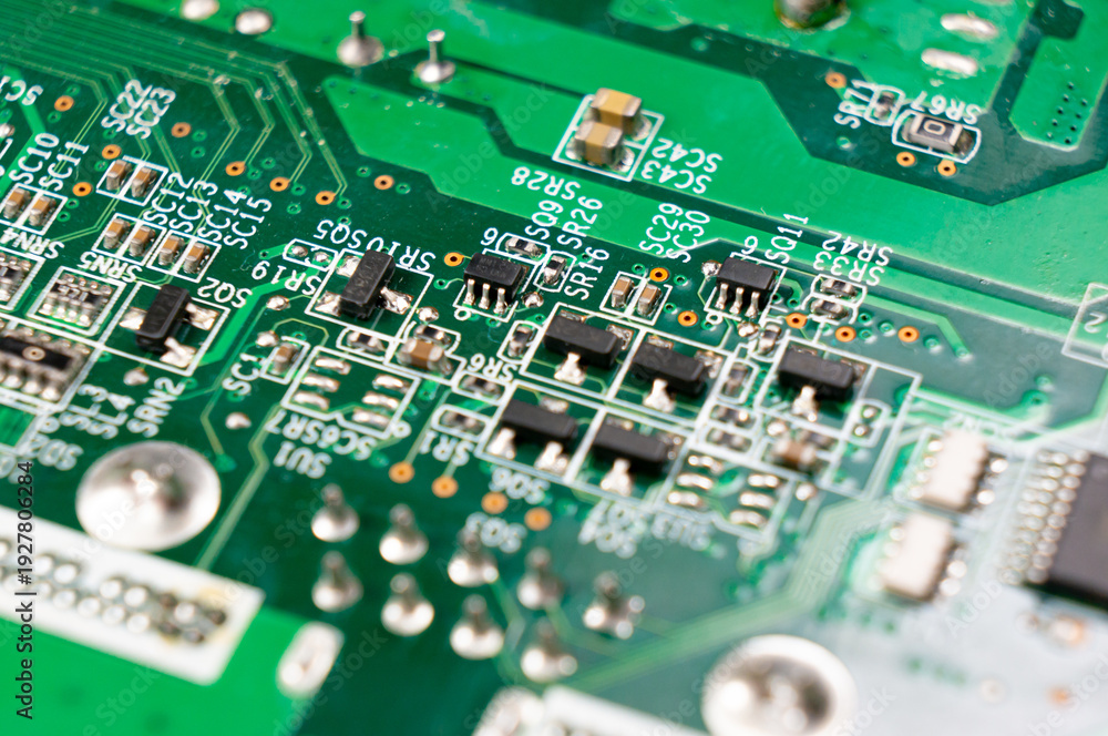 Obraz premium Close-up of a part of an electronic circuit board with electronic components