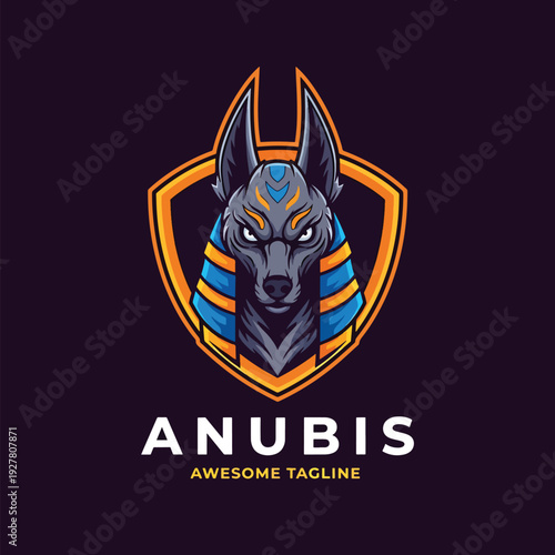 Dynamic Anubis-inspired jackal deity mascot logo within a protective shield emblem