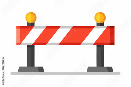 Red and white striped roadblock with orange lights on top