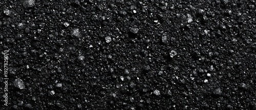 Wallpaper Mural A close up texture of dark granular material with scattered light flecks Torontodigital.ca