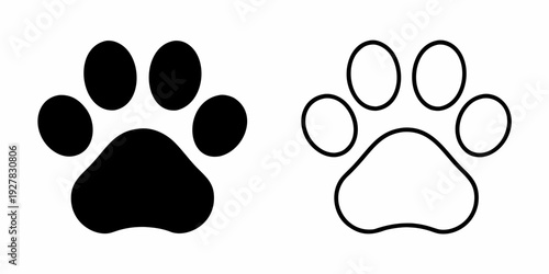 Two contrasting paw prints one solid black and one white outline
