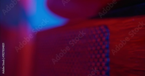 Close-up of a hand turning on the power of a Vinyl Record Player