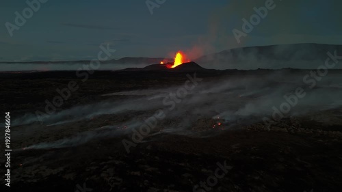 Wallpaper Mural Volcanic eruption glowing lava flow streaming from crater, dramatic smoke and fire, raw natural phenomenon in Iceland Torontodigital.ca