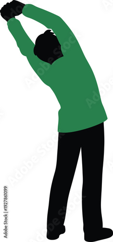 Silhouette of a person in a green shirt stretching with arms raised