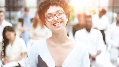 Pretty, young business woman giving a presentation