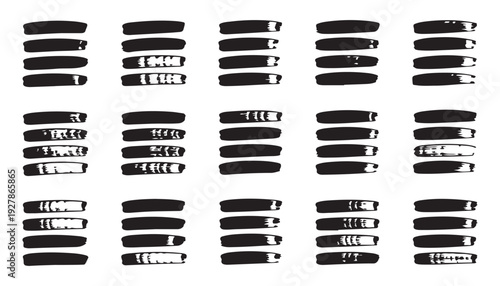 Set of isolated black ink brush strokes on white background various shapes and patterns