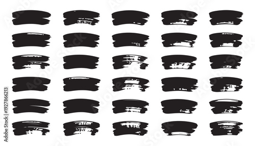 Assortment of black ink brush strokes on white background various shapes and textures graphic elements