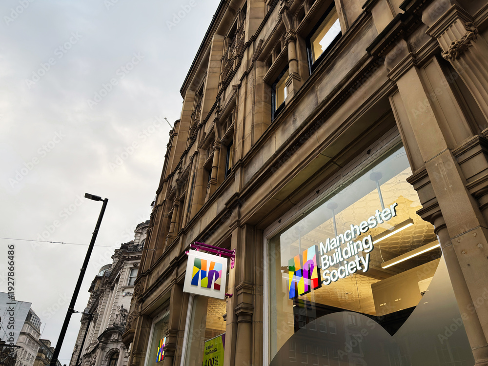 Naklejka premium Manchester Building Society office on a classic city street facade in Manchester UK