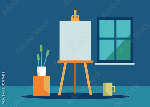 A blank canvas on an easel stands near a window in an artist's studio, with brushes and a mug.