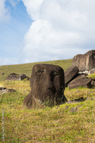 The Moai statue at Ahu Vinapu with only its head visible, Easter Island, November 2025