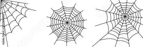 Black spider web illustration set featuring detailed radial and corner cobweb designs isolated on light background for Halloween decoration and spooky graphic projects